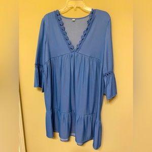Fun, flowing blue dress with V-neck.